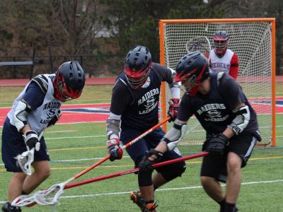 Picture of students playing lacrosse