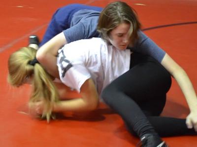 Picture of two students wrestling 