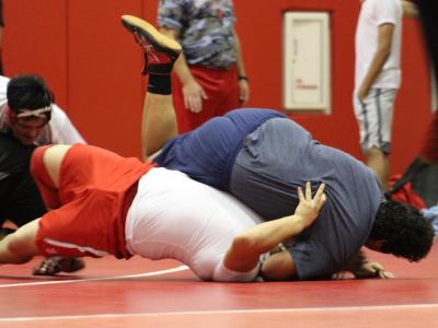 Picture of two students wrestling 